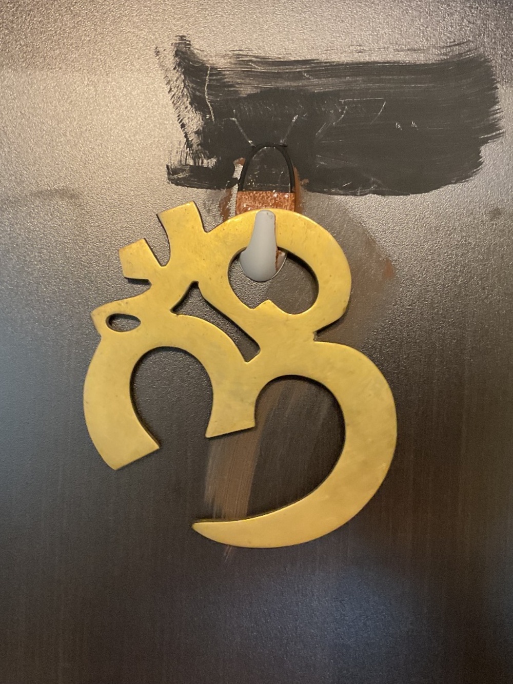 Heavy brass symbol